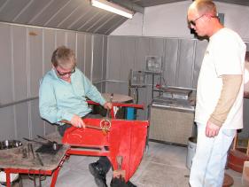 Randy and Allan working on a beermug handle